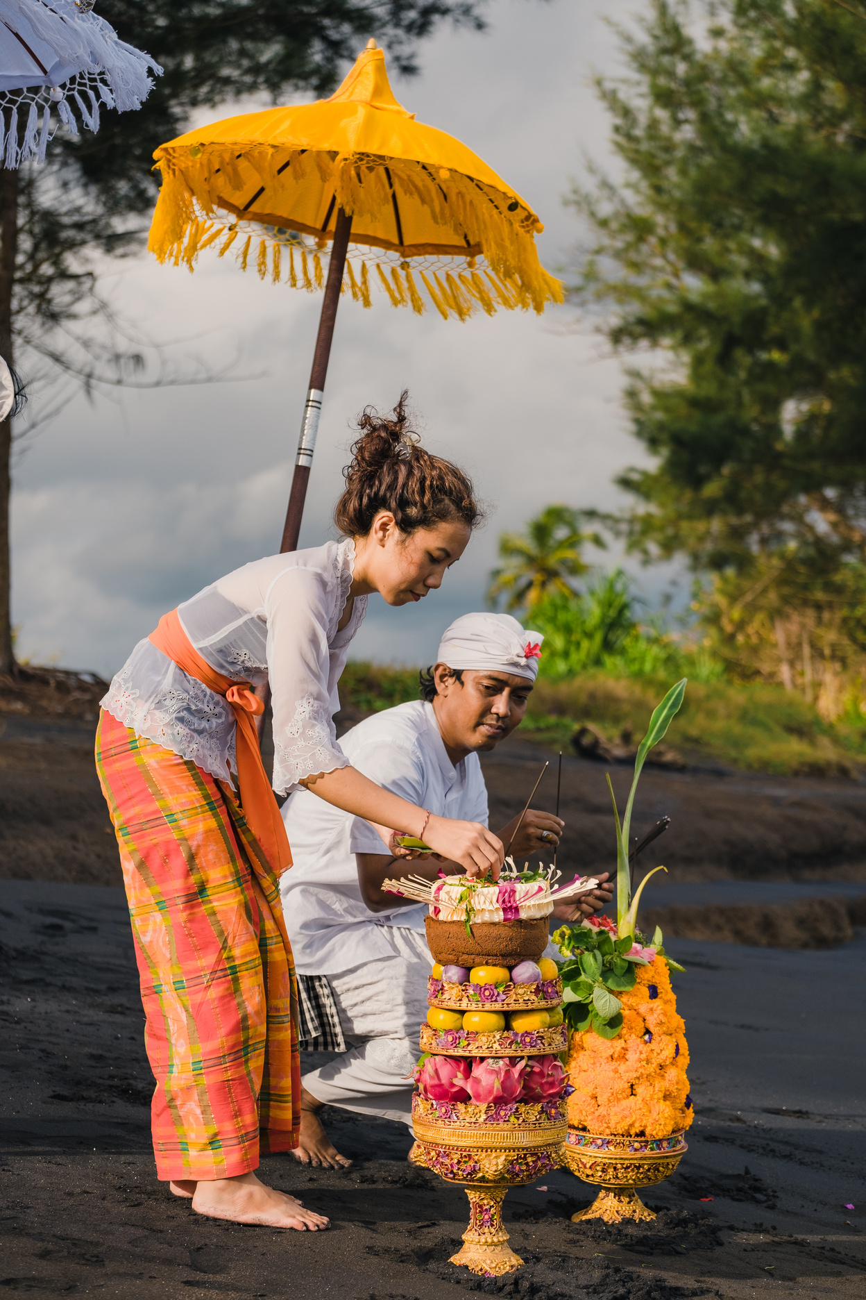 Woman Giving Offering for Nyepi